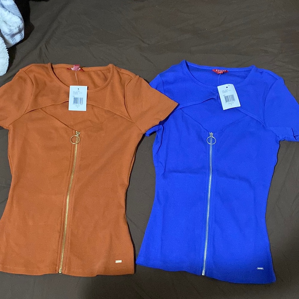 2 pack- small cut out top shirts by Guess- was a gift but too small for me
